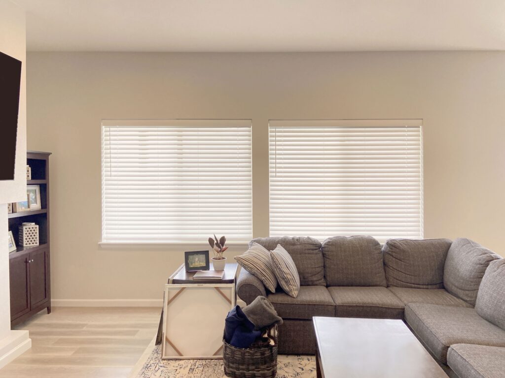 Hunter Douglas Parkland Natural Wood Blinds installed in Colorado living room