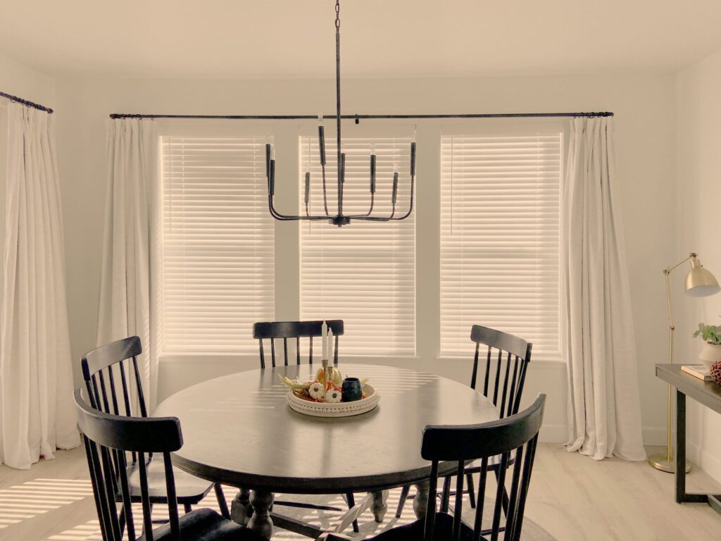 Hunter Douglas Applause Cellular Shades and Parkland Natural Wood Blinds with Ultraglide, Cord Lock operation, Bottom Up functionality, and light-filtering performance.