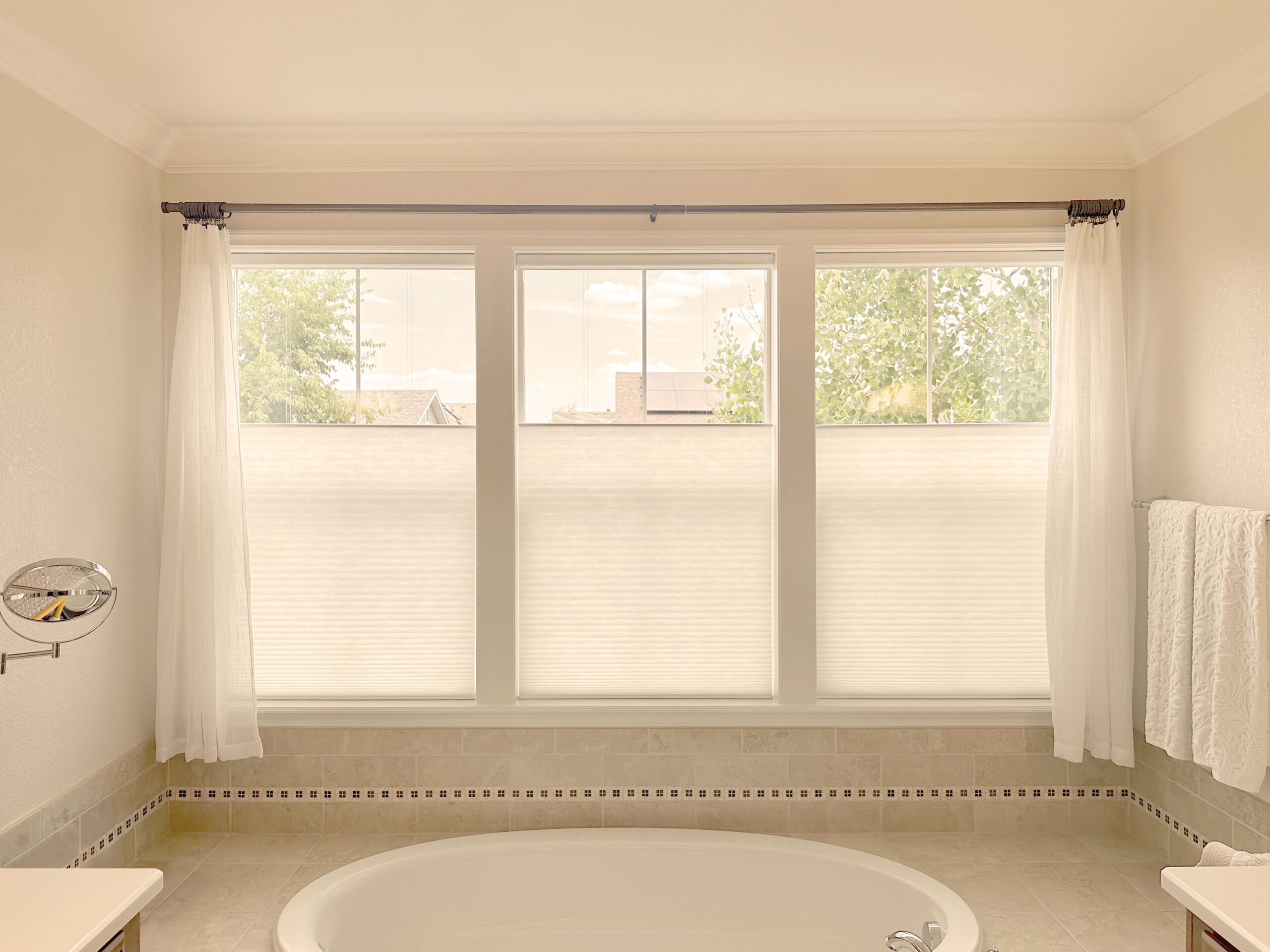 Hunter Douglas Applause Cellular Shades with PowerView Automation, Top-Down/Bottom-Up, and custom curtains for Centennial bathroom.