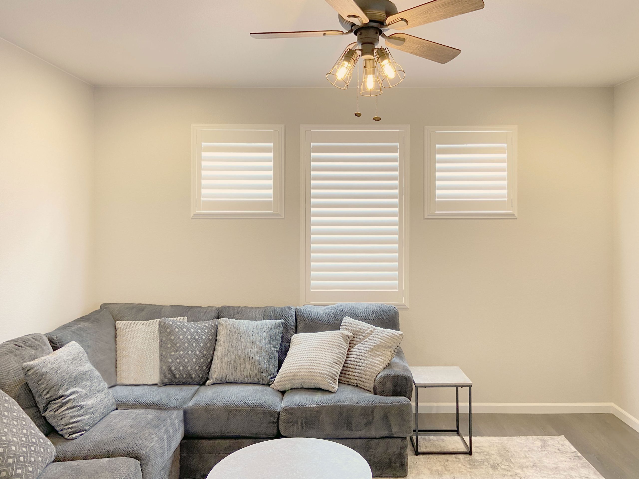 Hunter Douglas Palm Beach Polysatin Shutters with Hidden Tilt louvers and Z Frame installation in Centennial homes