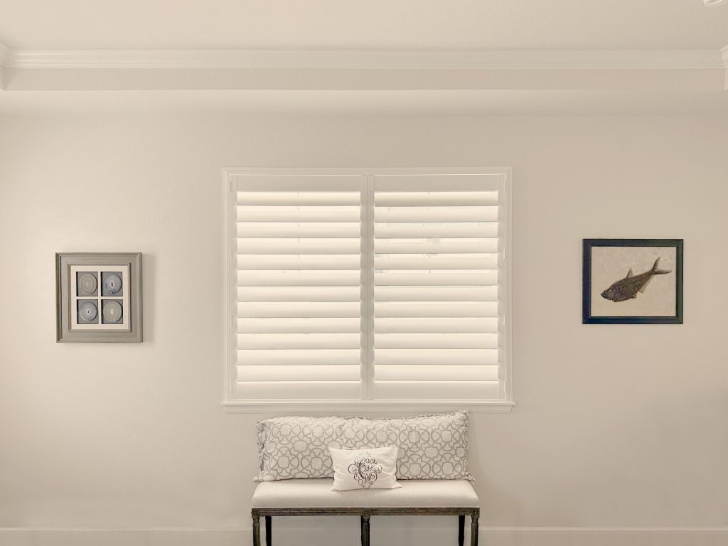 Hunter Douglas Palm Beach Polysatin Shutters in Denver with exterior tilt bar and Z frame design