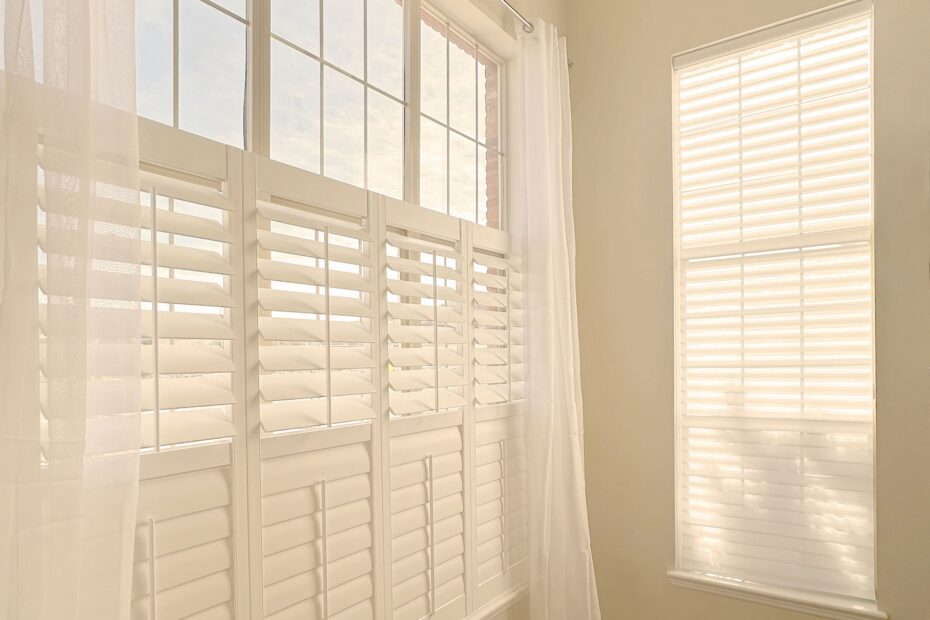 Light-filled room with sheer curtains creating a bright, airy atmosphere.