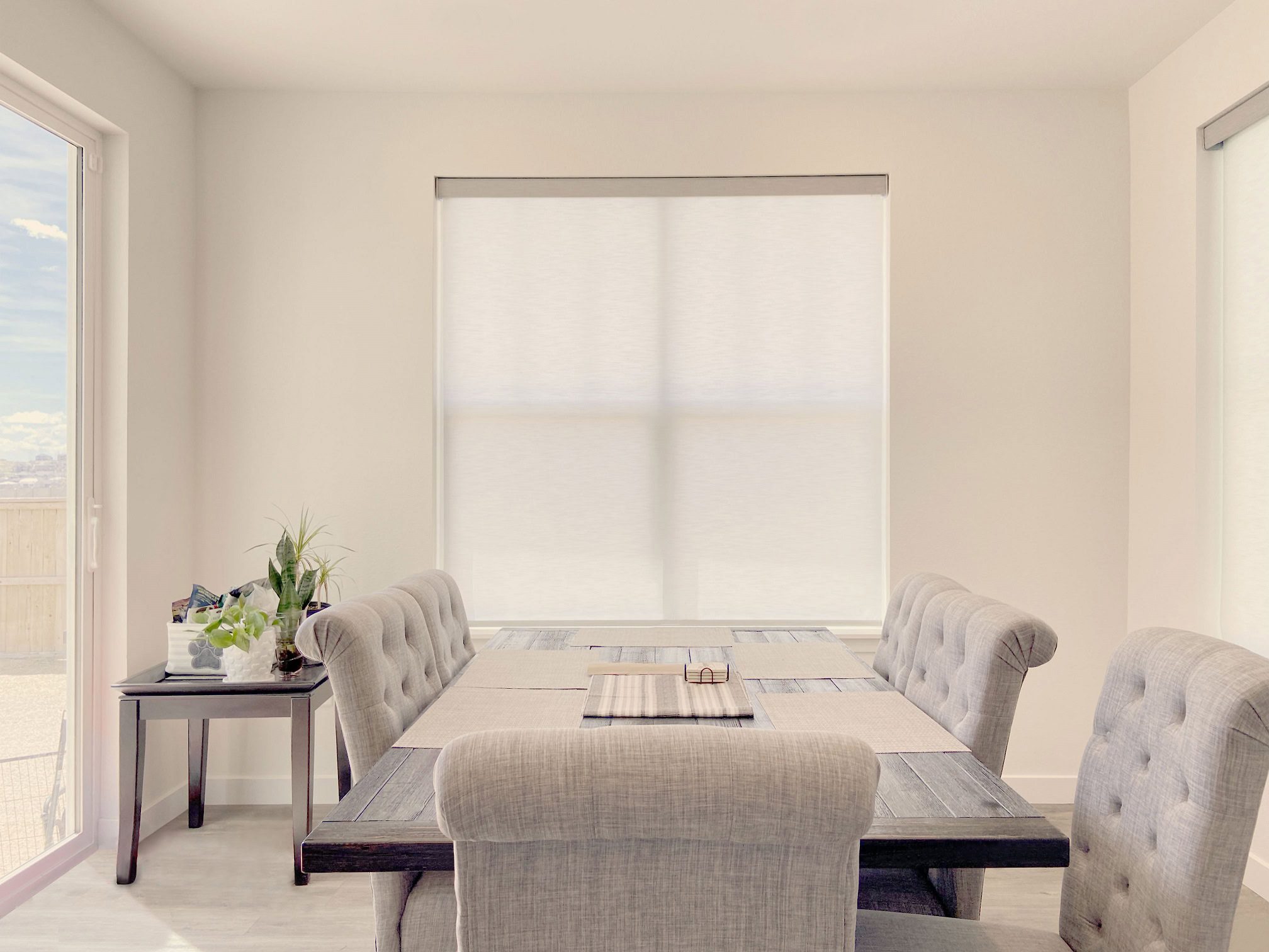 Motorized and Light Filtering Designer Roller Shades for dining rooms in Boulder.