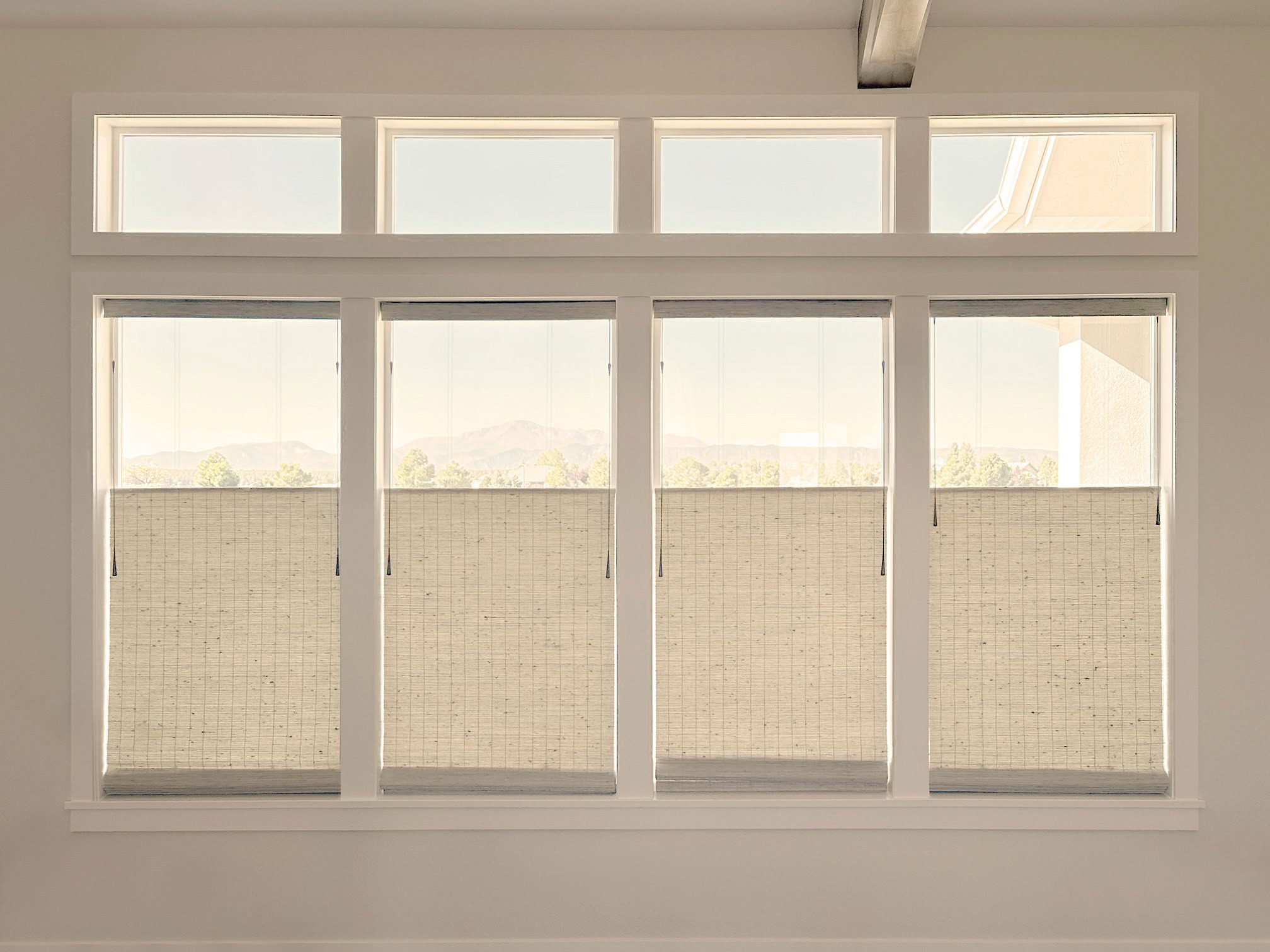 Provenance Woven Wood Shades with UltraGlide, Top-Down Bottom-Up, and Light Filtering features for Fort Collins home