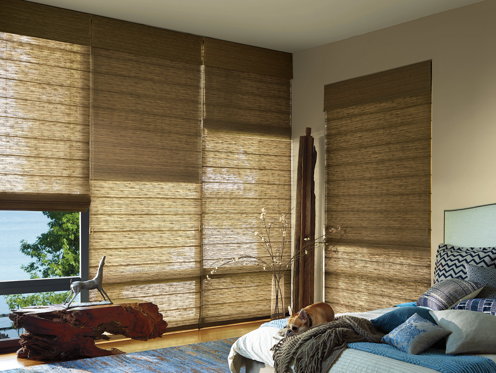 Hunter Douglas Alustra Woven Textures Roman Shades with Light Filtering fabric and Custom Clutch operating system.