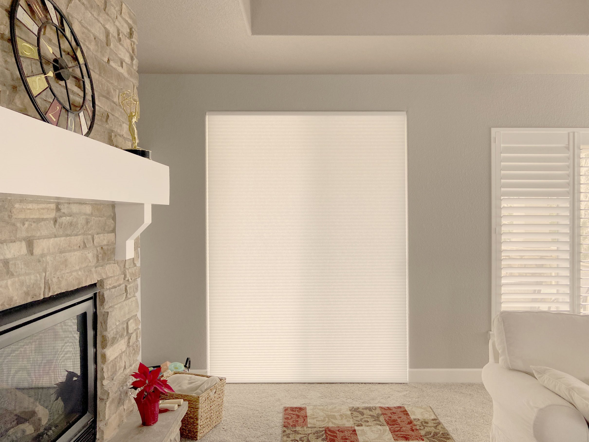 Hunter Douglas Duette Cellular Shades with PowerView Automation and light filtering fabric for large patio door in Colorado home