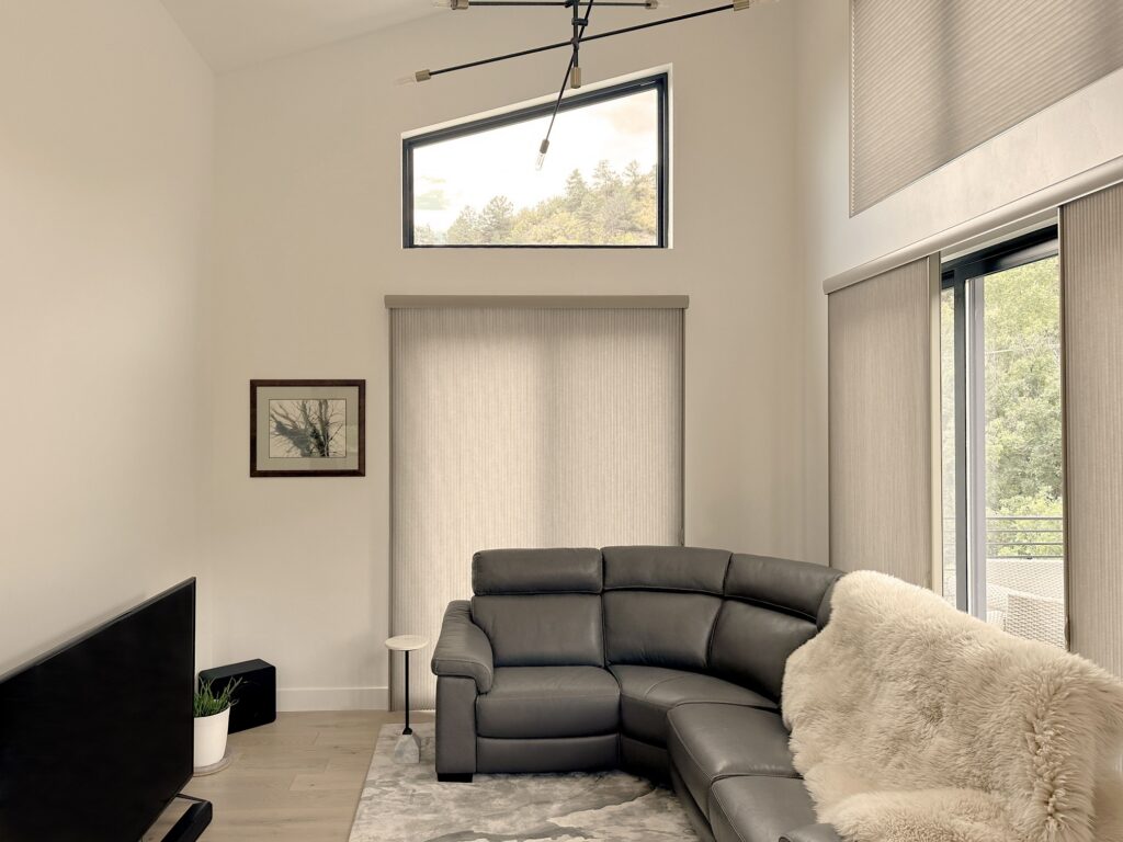 Hunter Douglas Duette Cellular Shades and Duette Vertiglide with Light Filtering fabric, featuring Vertiglide vertical operation and motorization for Colorado living room