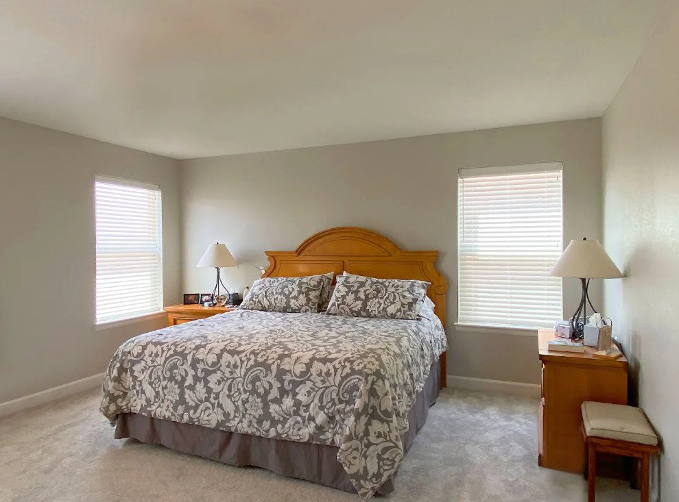 Hunter Douglas EverWood Composite Wood Blinds with Cord Lock operation in Lakewood bedroom