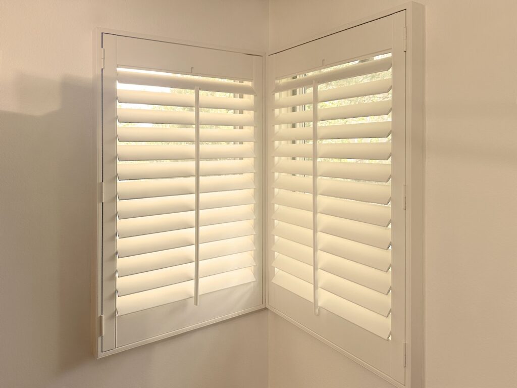 Hunter Douglas Heritance Hardwood Shutters with Front Center Tilt operation and L Frame design for Colorado home