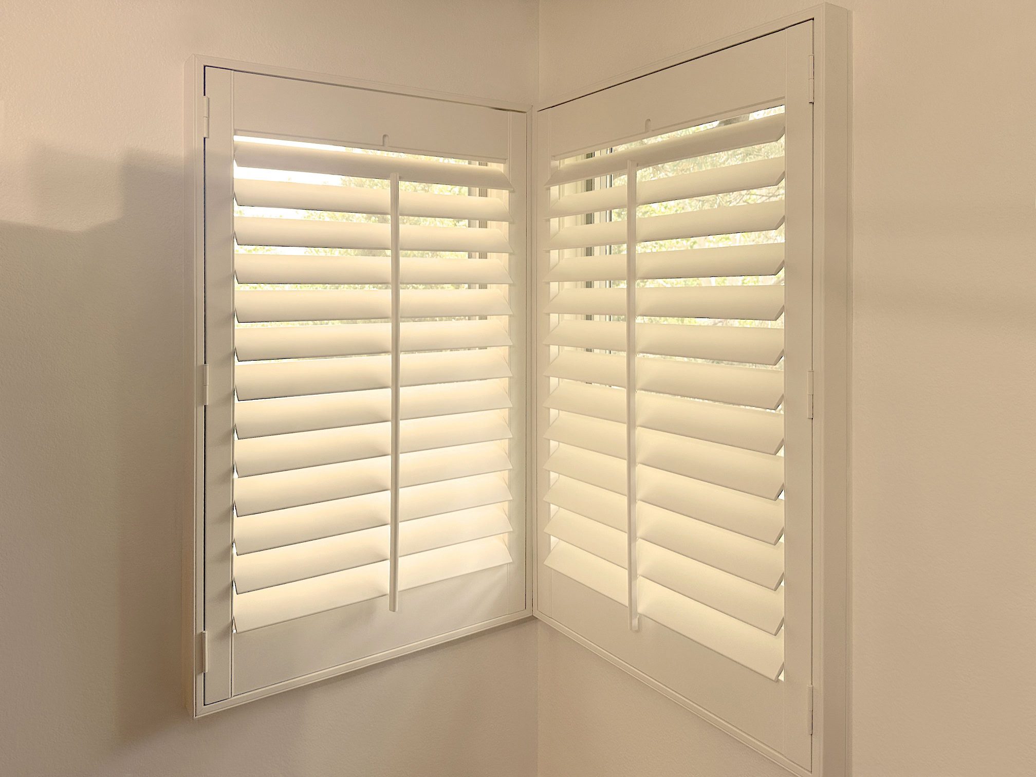 Hunter Douglas Heritance Hardwood Shutters with Front Center Tilt and L Frame design for Colorado home
