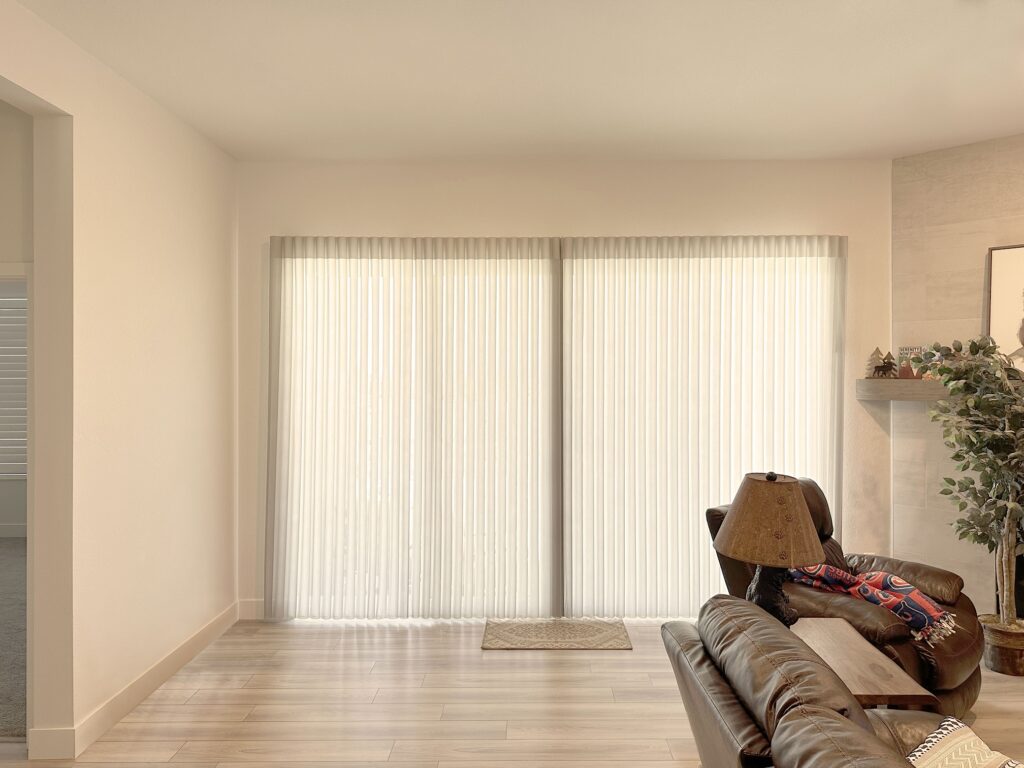 Hunter Douglas Luminette Privacy Sheers with Wand Control, Split Stack Vertical configuration, and light filtering fabric for Colorado homes