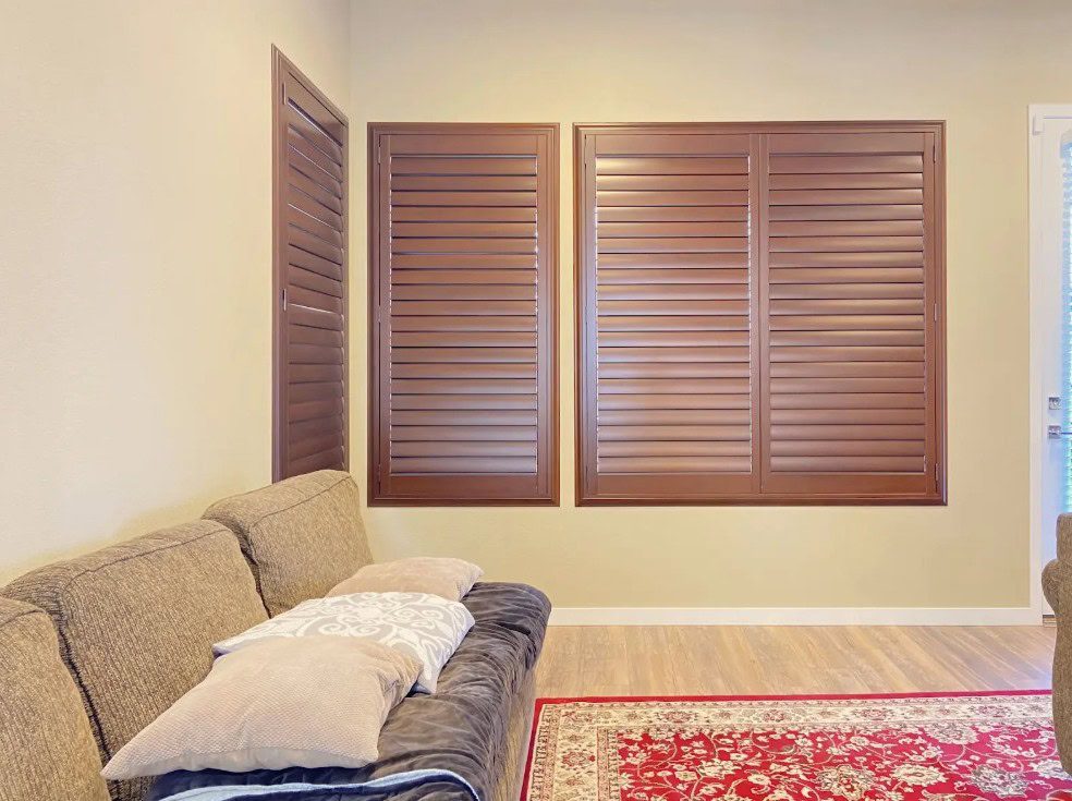 Custom Hunter Douglas NewStyle Hybrid Shutters with Hidden Tilt operation in Lakewood home