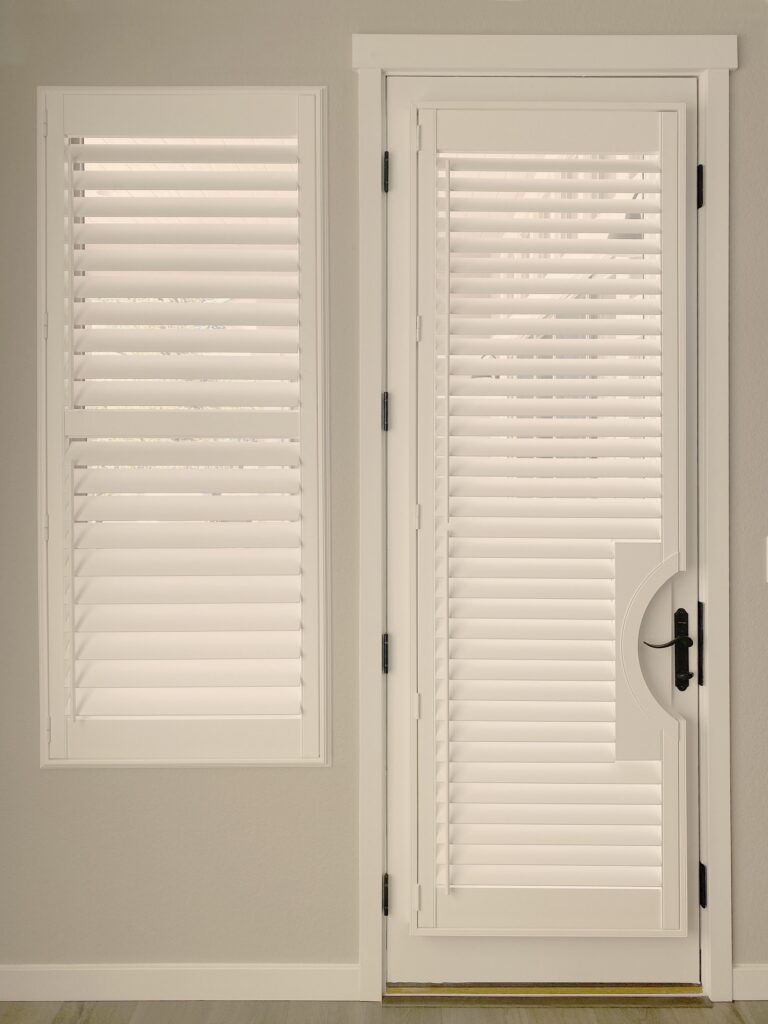 Hunter Douglas Palm Beach Polysatin Shutters with Front Side Tilt, Specialty Shape design, and Z Frame for door and window