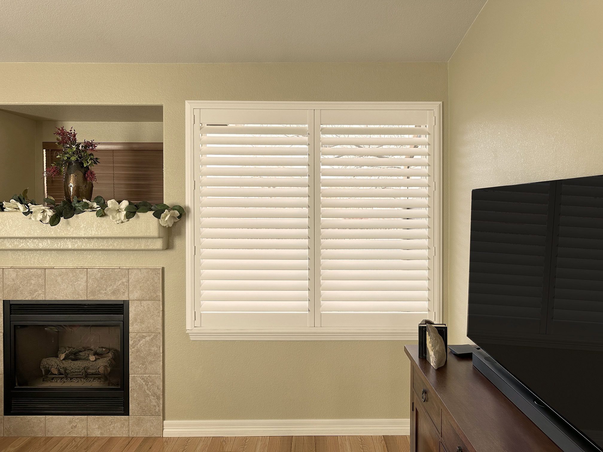 Hunter Douglas Palm Beach Polysatin Shutters with Hidden Tilt and Z Frame for Colorado living room