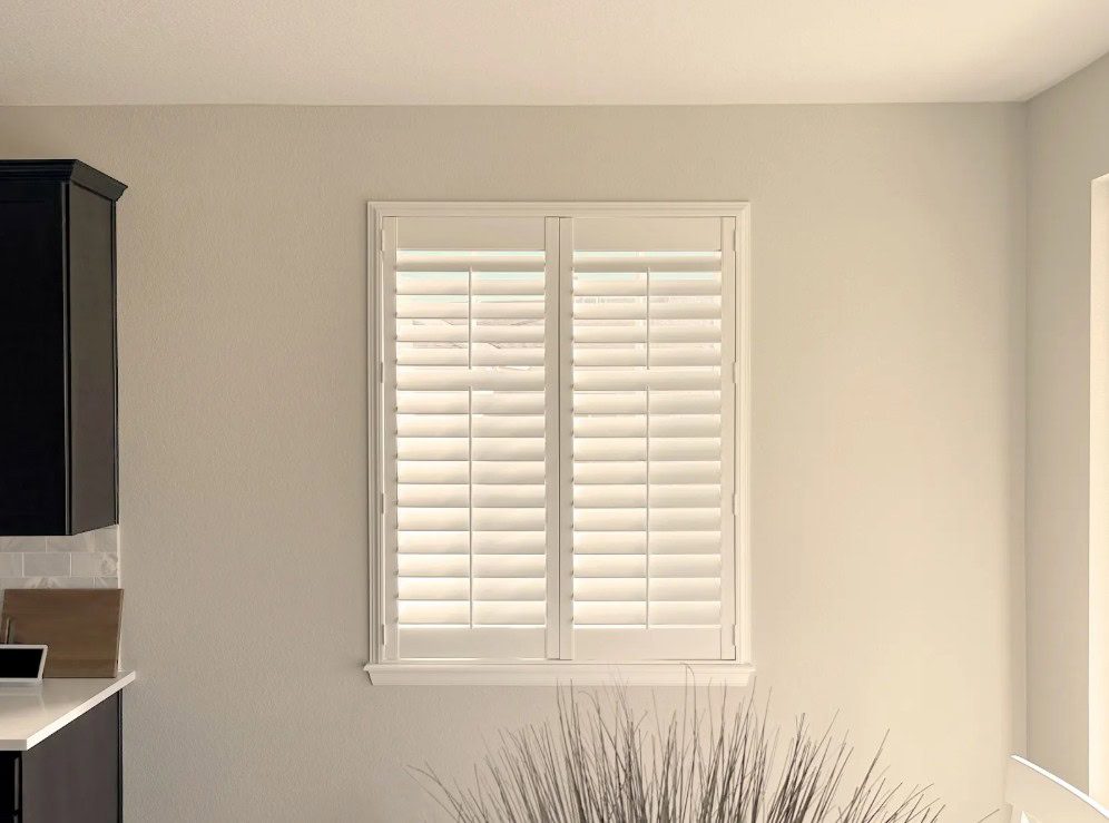 Hunter Douglas Palm Beach Polysatin Shutters with Front Center Tilt and Z Frame in Thornton home