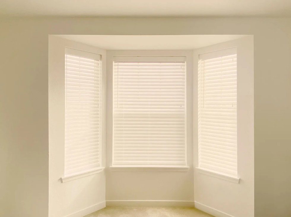 Hunter Douglas Parkland Natural Wood Blinds with Cord Lock operation in Lakewood home