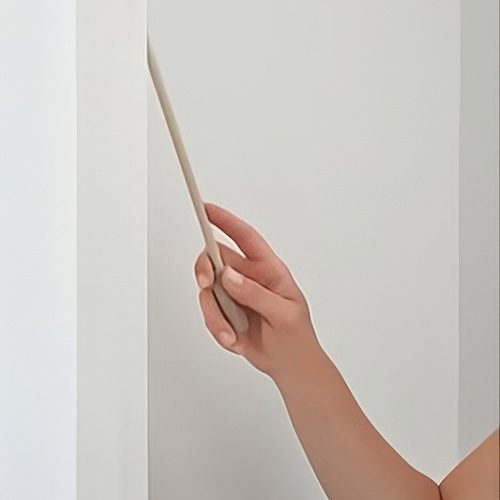 Hand operating window treatment system with a remote or wand.