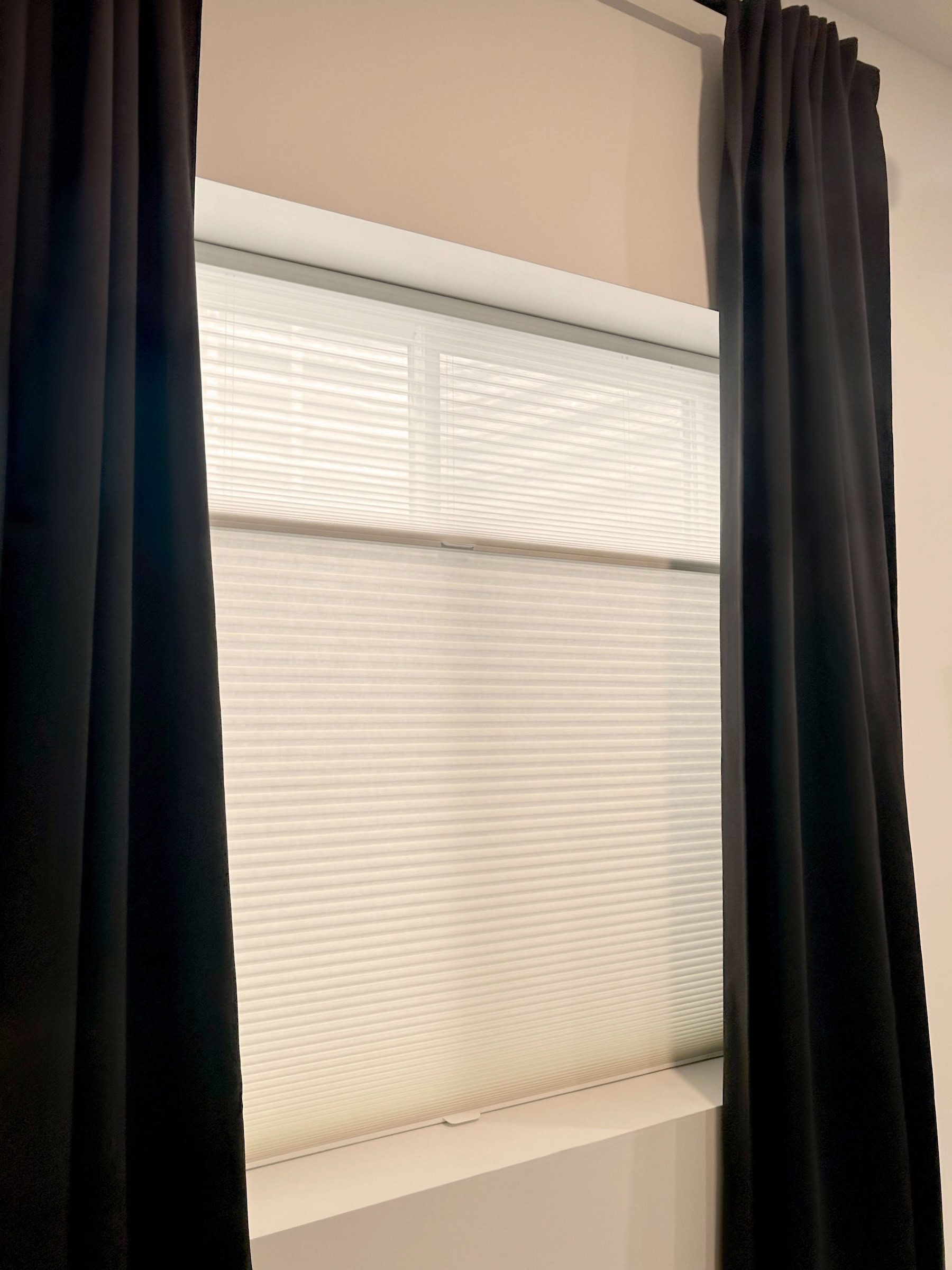 Hunter Douglas Duette® Cellular Shades layered with curtains are perfect for Aurora Colorado homes