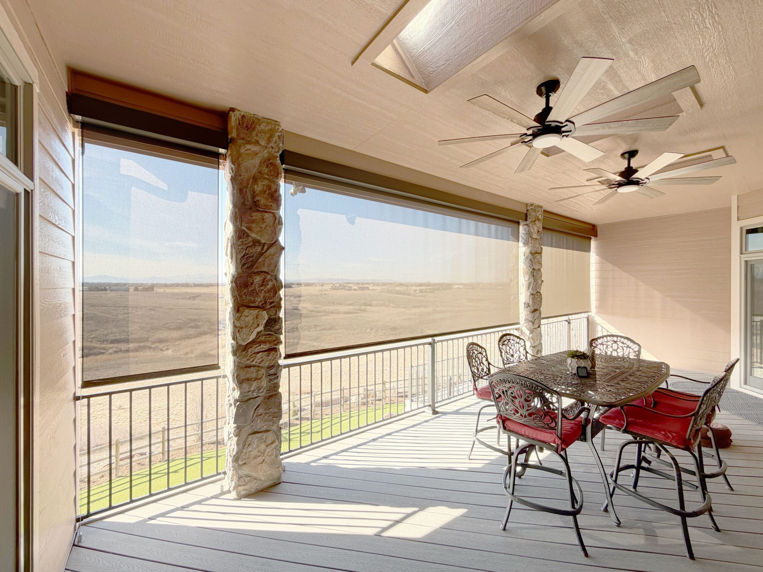 Motorized Insolroll Patio Solar Shades with Light Filtering Fabric installed in Colorado Homes
