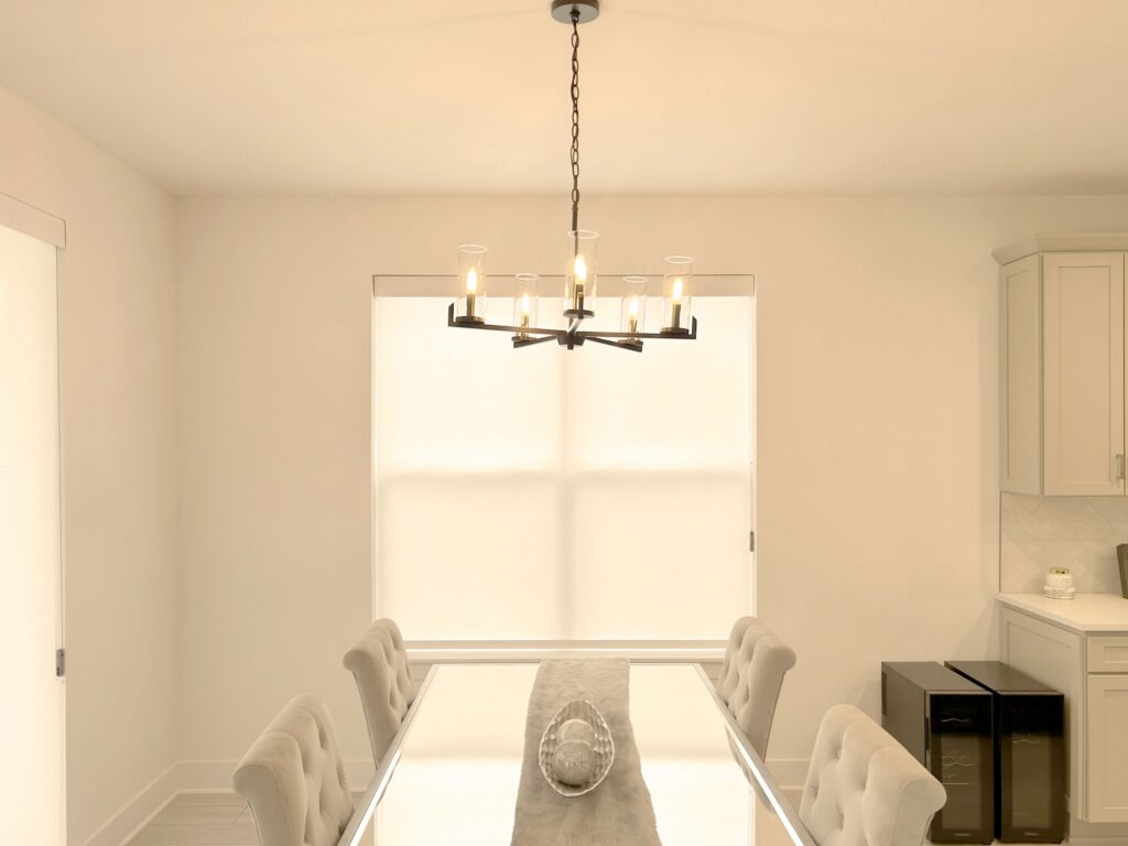 Hunter Douglas Designer Roller Shades with Custom Clutch and Light Filtering Fabric for Castle Rock Dining Room
