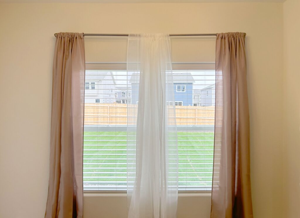 Alta window blinds layered with curtains for Westminster, CO home