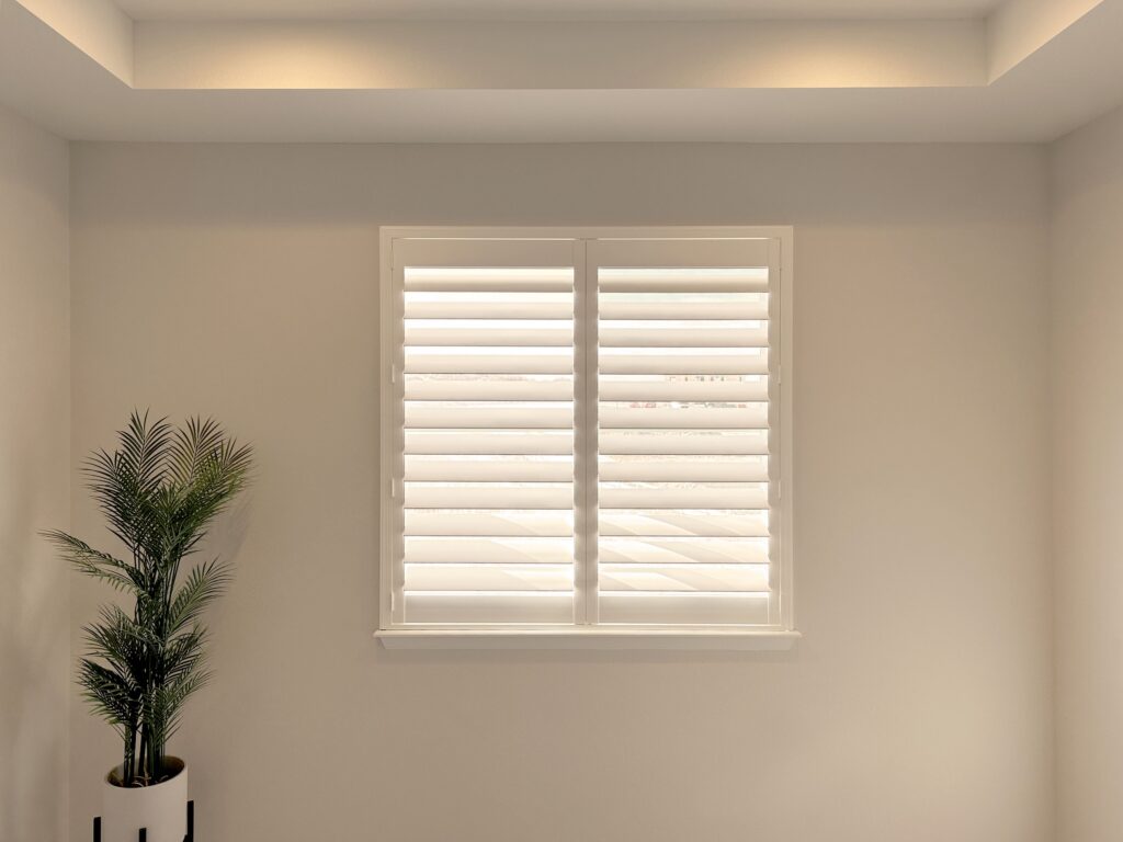 Hunter Douglas Palm Beach Polysatin Shutters with Hidden Tilt and Z Frame installed in Westminster home