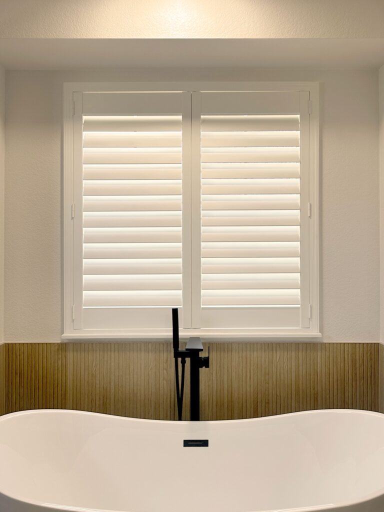 Motorized Hunter Douglas Palm Beach Polysatin Shutters Installed in Arvada Bathroom