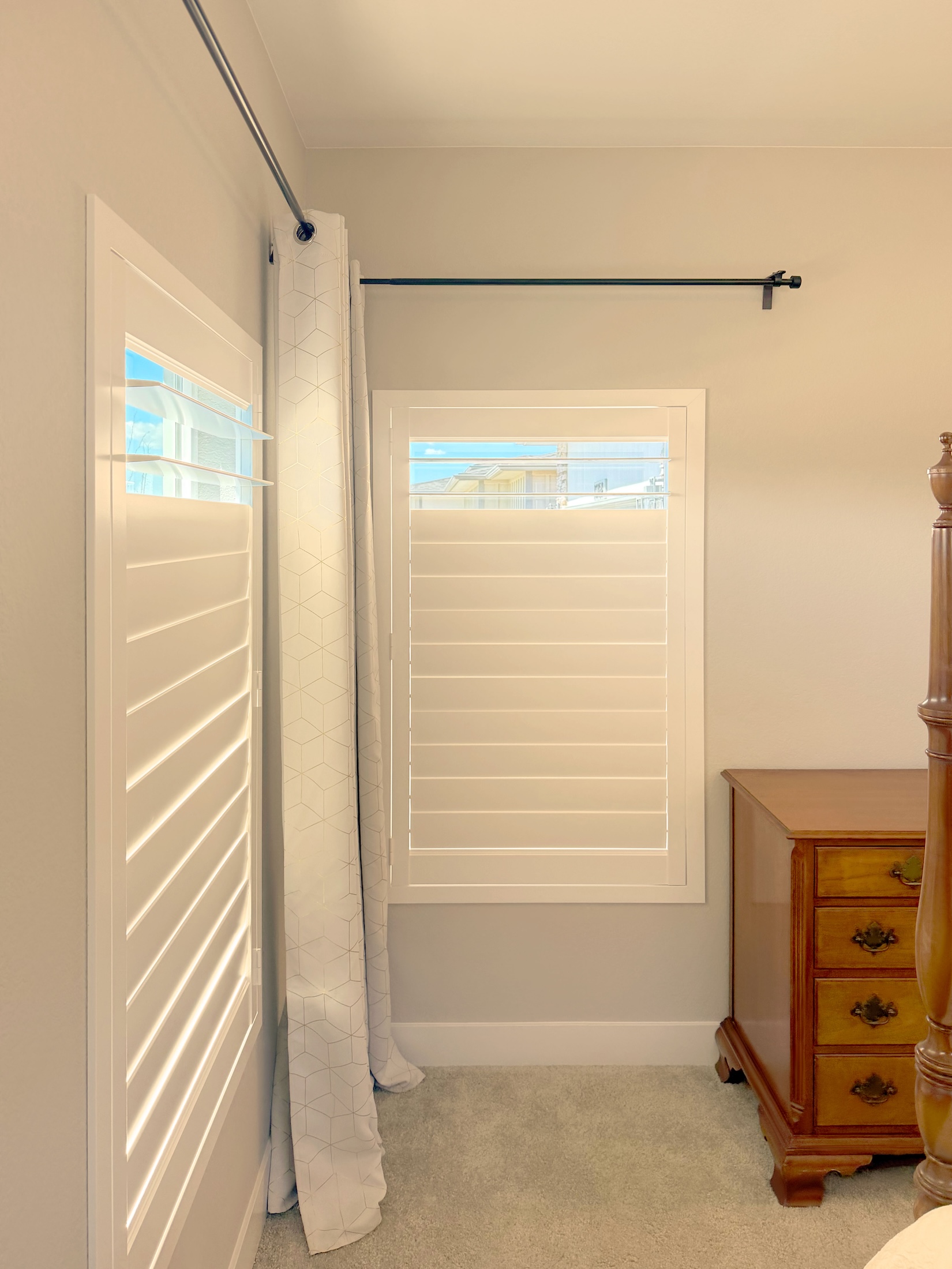 Hunter Douglas NewStyle Hybrid Shutters with Curtains for Arvada Bedroom