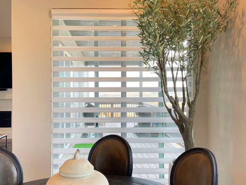 privacy sheers installed in dining room patio door