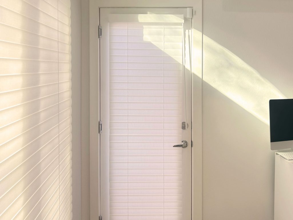 Hunter Douglas Aria Soft Blinds for doors in Denver home